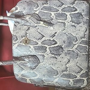 Antonia Melani snake skin hand bag